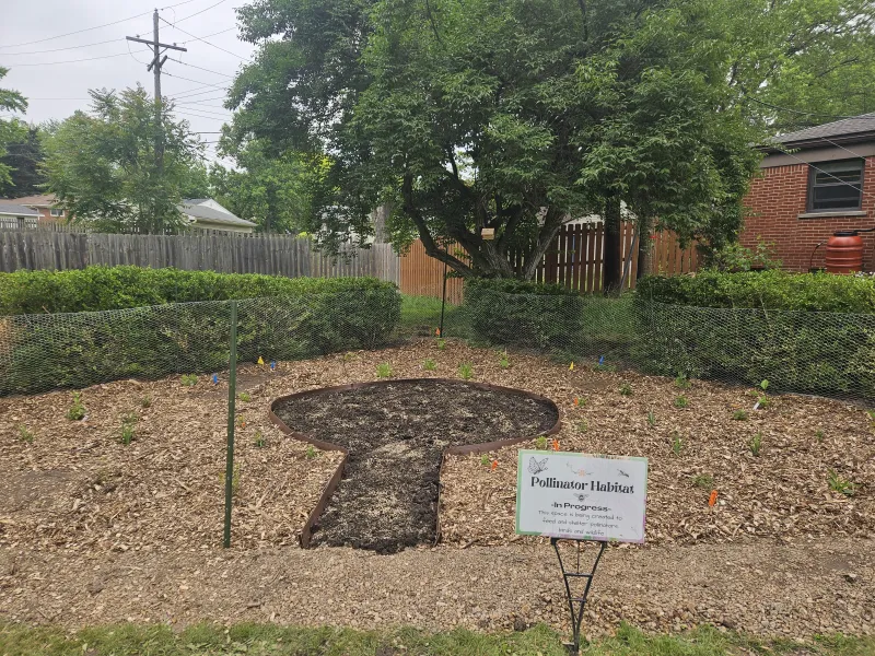 The completed garden with sign