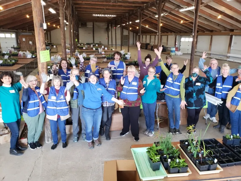 Fall sale volunteers celebrating