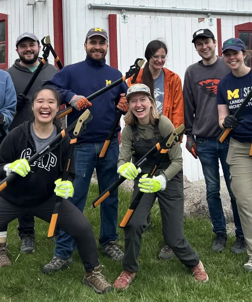 people with hand tools