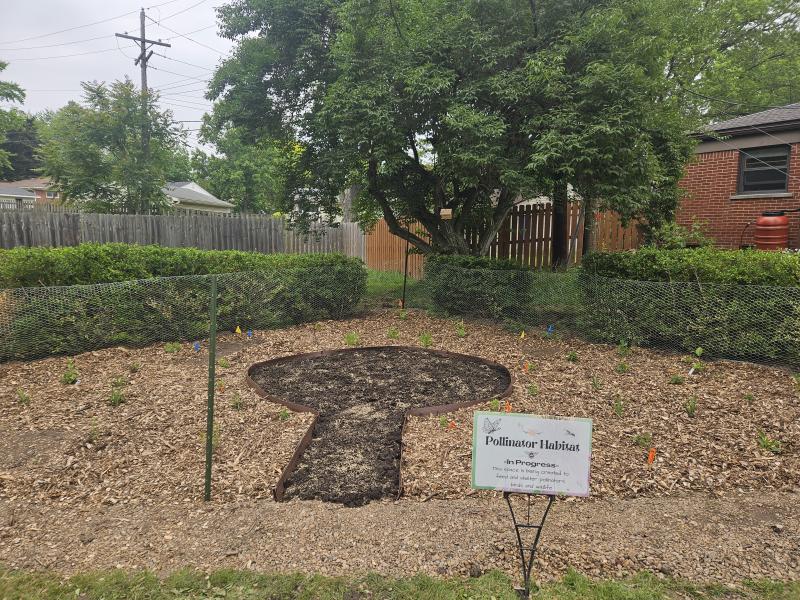 The completed garden with sign