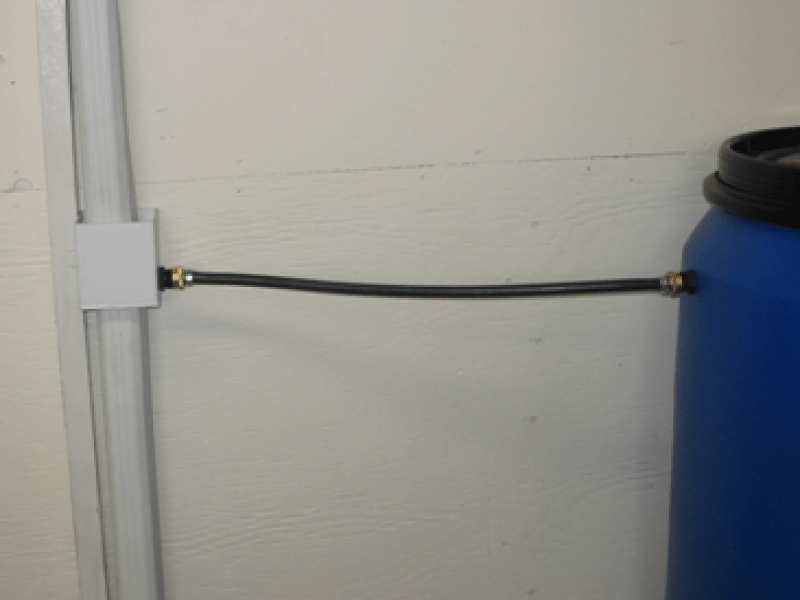 Downspout diverter installed on a regular barrel.