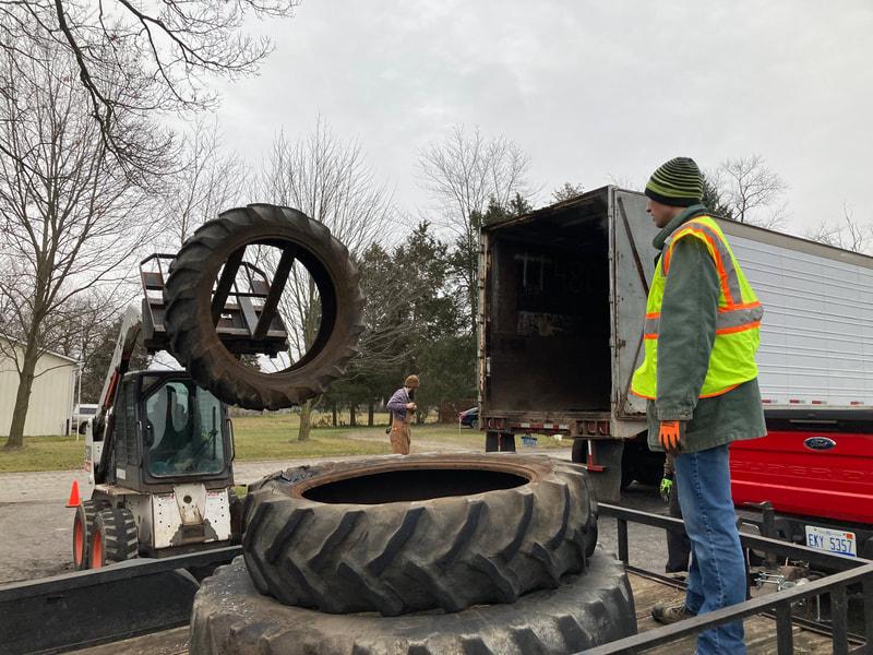 Bobcat loading tractor tires