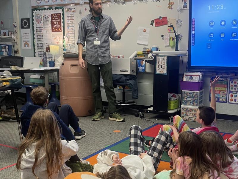 Resource Specialist educating 3rd graders on water catchment