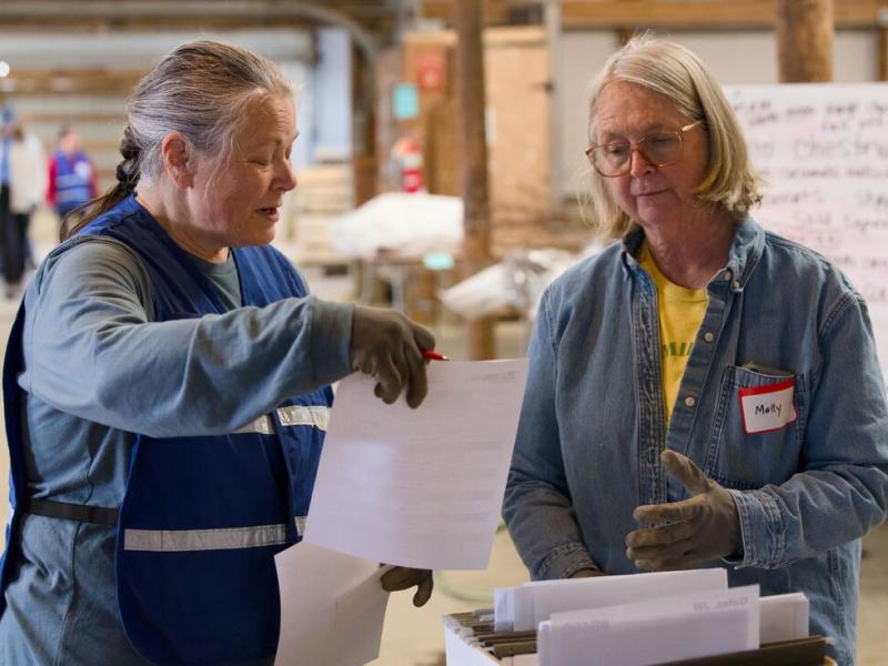 Volunteers working on customer orders (Photo Credit: Paul Michael Peters)