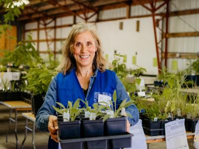 Volunteer supporting native plant sales