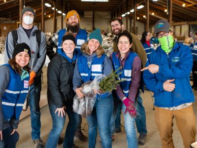 WCCD Staff posing for a photo at a plant sale. 