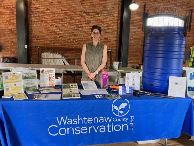 Staff educating about the WCCD at the Ypsilanti Earth Day Festival