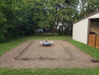 Stage three of community member's rain garden transformation