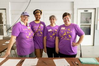 volunteers in the voting area