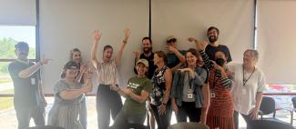 WCCD Staff all together pointing at new executive director