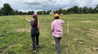 staff walking the fields