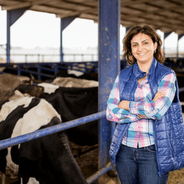 female farmer with dairy cows