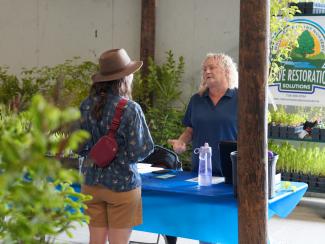 Vendor at the Native Plant Expo - Photo credit Paul Michael Peters