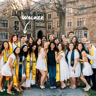 Walker pictured with other U of Michigan grads