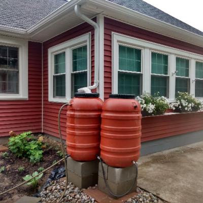 2 Terra Cotta Rain barrels installed at home