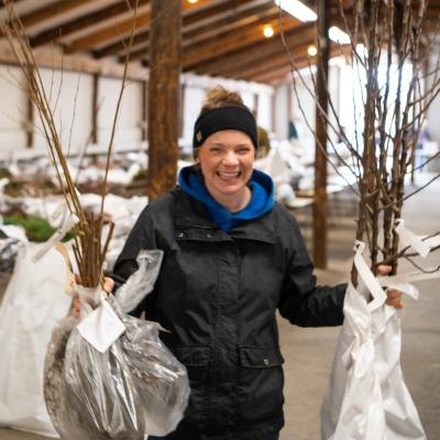 Tree Sale - Person with seedlings